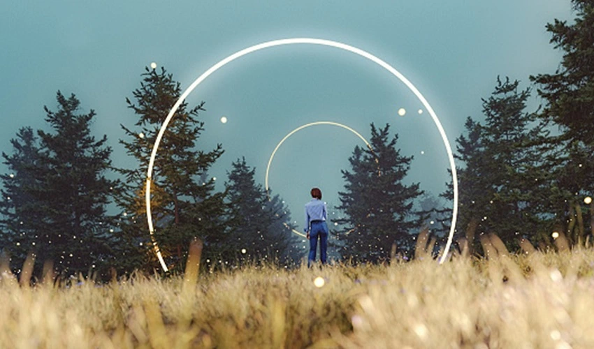 man standing in a field with light circles around him