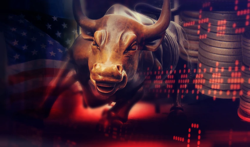 Bronze Bull surrounded by layered coins, a stock board, and an american flag