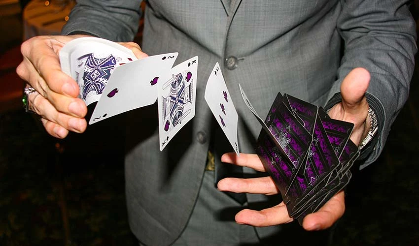 Hands shuffling cards