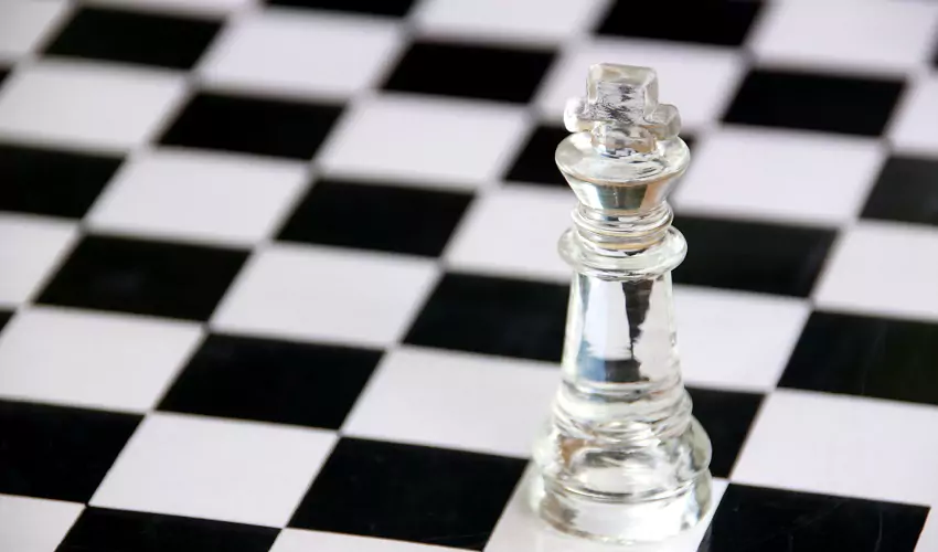 Black and white chess board with piece