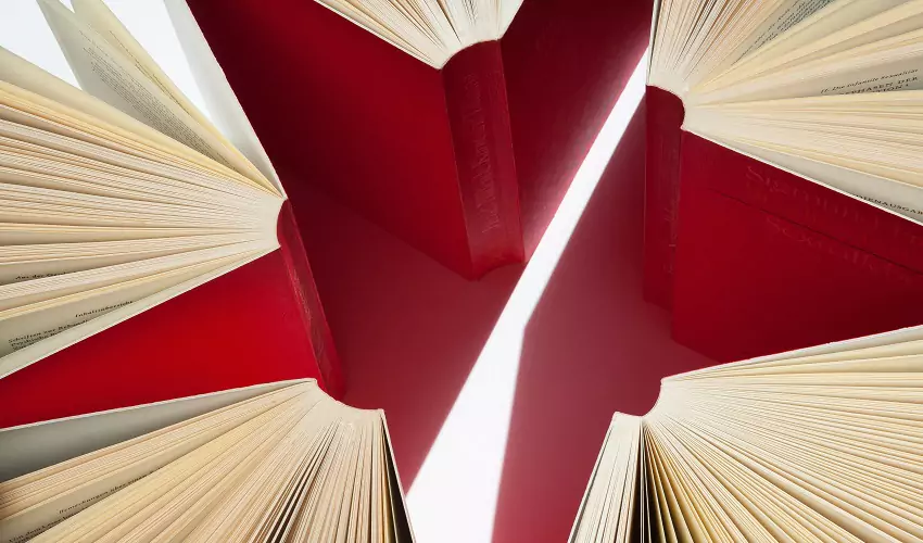 Books making a red star