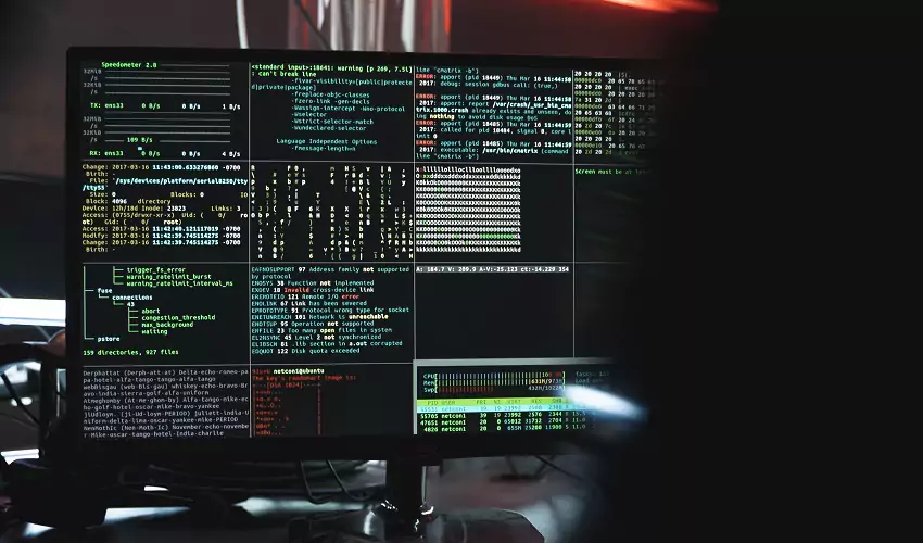 green hacking code on a computer monitor
