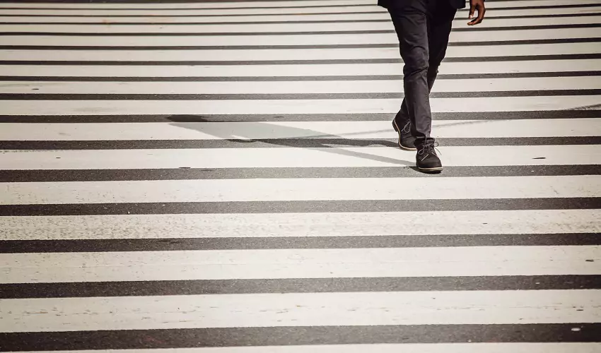 Person crossing cross walk