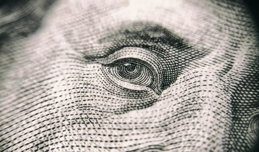 close up of an eye on American money