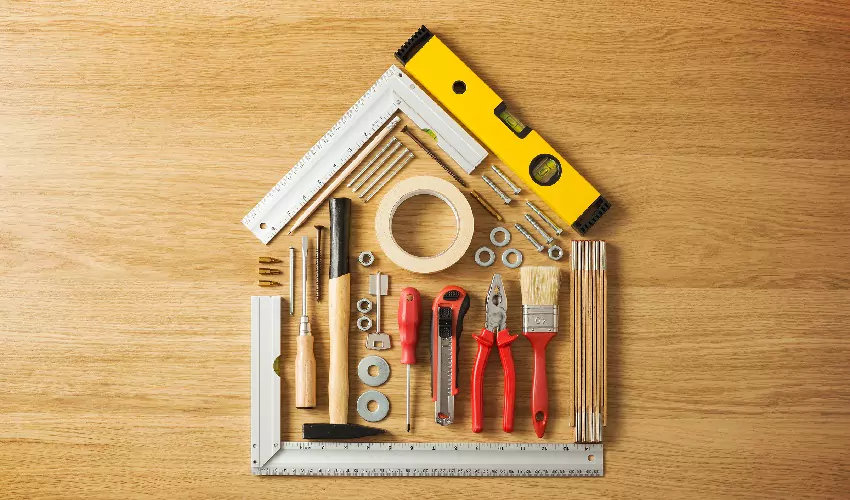 tools placed in the shape of a house