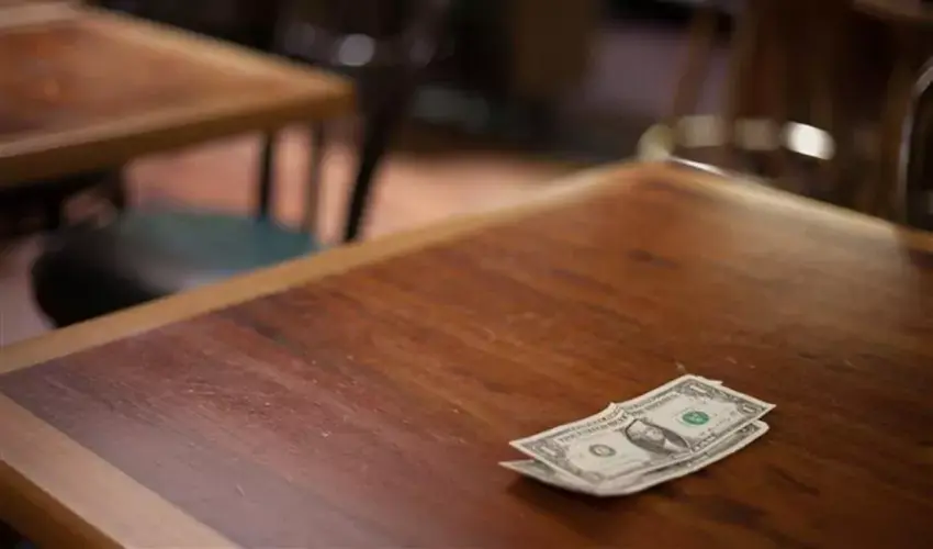 Two dollars on a table